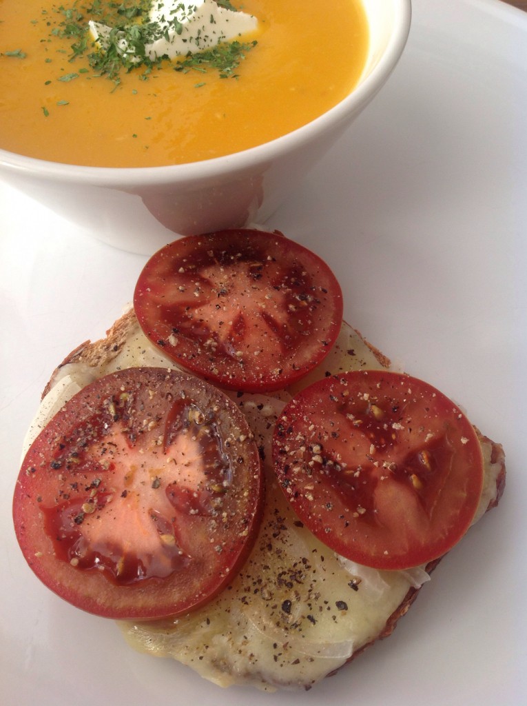 cheese and tomato toast with a side of butternut squash soup